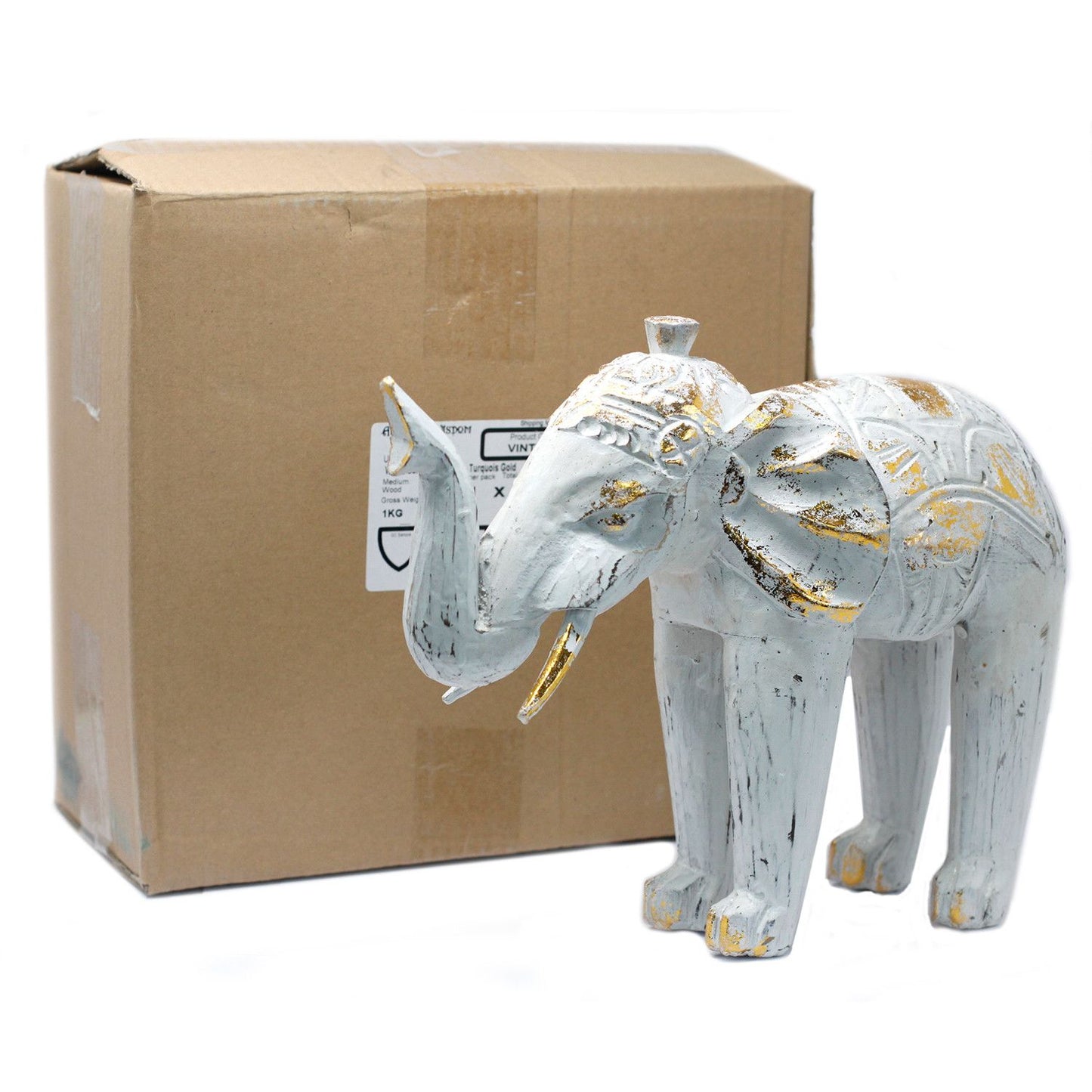 Elefante Tallado en Madera - Oro Blanco